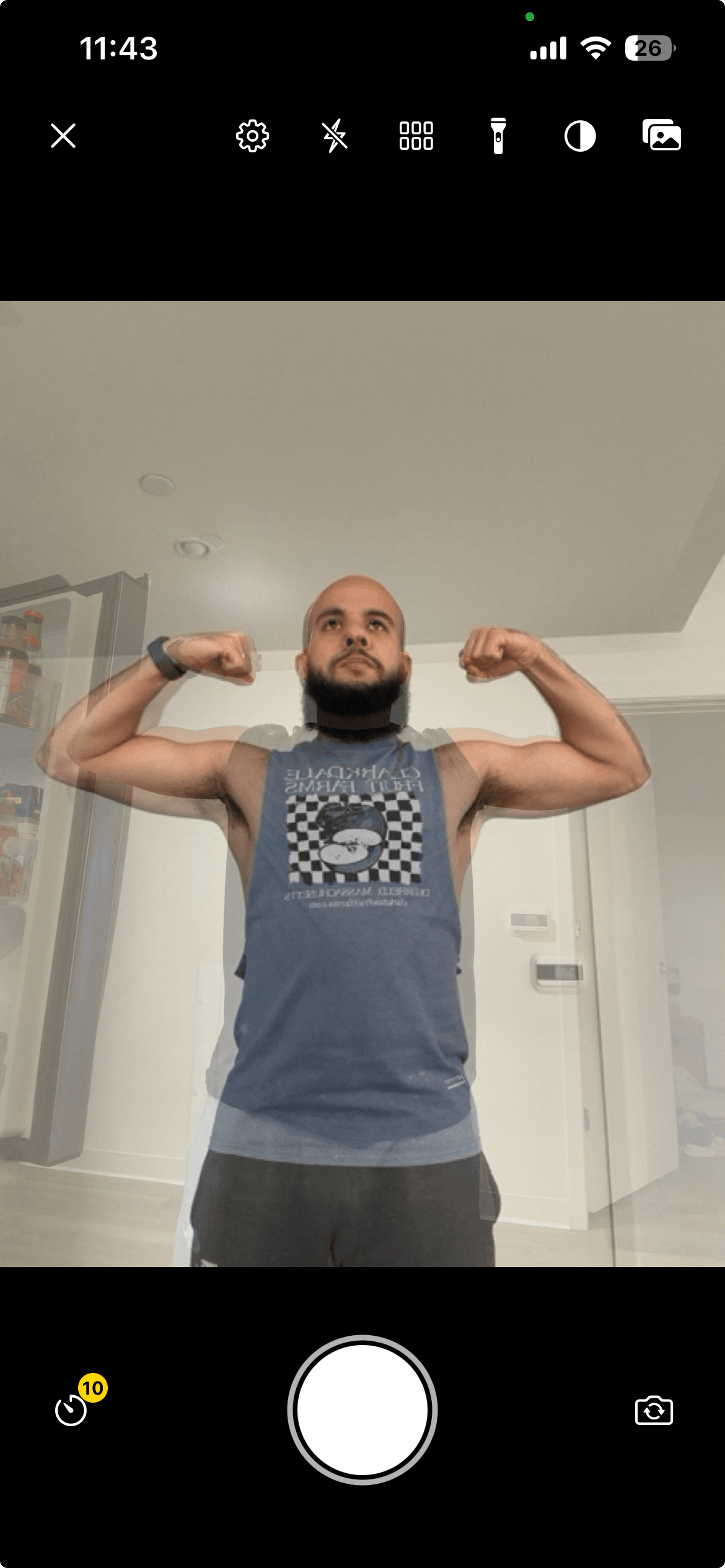 Camera capture view using a previous photo as an overlay for alignment